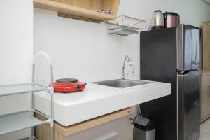 Comfort Studio Apartment M-Town Residence By Travelio