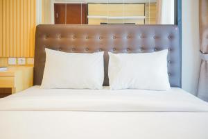 Cozy 3BR Asatti Apartment near ICE BSD By Travelio