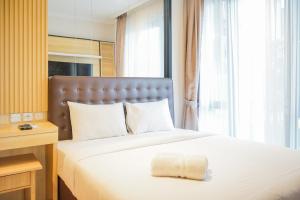 Cozy 3BR Asatti Apartment near ICE BSD By Travelio