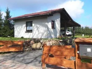 Ferienhaus mit Waldsauna am Kranichfeld - Altenhof