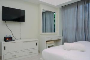 Studio Apartment with Garden View at The Springlake View Summarecon By Travelio