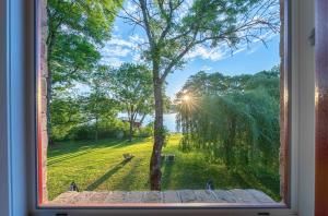 Zwergtaucher - Ferienwohnung mit Balkon, Seeblick & Freizeitangeboten am See