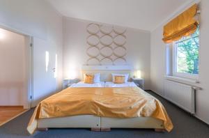 Fischadler - Ferienwohnung mit Terrasse, Kamin, Bootsverleih & Seezugang