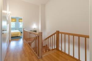 Fischadler - Ferienwohnung mit Terrasse, Kamin, Bootsverleih & Seezugang