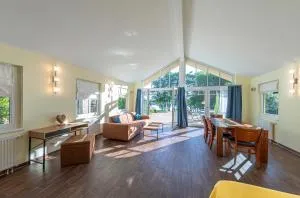 Wildgans - Stilvolles Ferienhaus mit Terrasse, Seeblick & Naturidylle am Loppiner See - Ulrichshusen