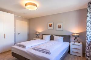 Müritzsonne - Apartment in der Hafenresidenz mit Balkon & Wellness