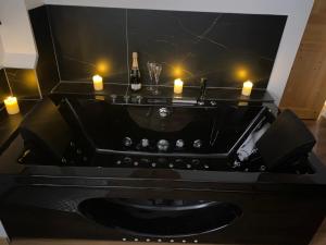 Au Refuge des amoureux avec baignoire Balnéo 2 personnes