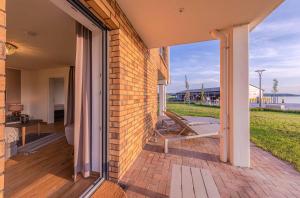 Am Lütten Meer - Apartment in der Hafenresidenz mit Terrasse & Müritzblick