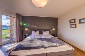 Am Lütten Meer - Apartment in der Hafenresidenz mit Terrasse & Müritzblick