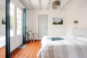 Maisons de vacances Cottage au calme avec terrasse et jardin : photos des chambres