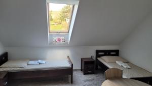 Pokoje Gościnne Pod Kokoczem