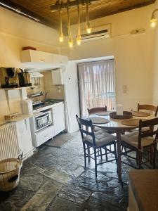 COZY VILLAGE HOUSE ΑΓΙΟΣ ΛΑΥΡΕΝΤΙΟΣ ΠΗΛΙΟΥ