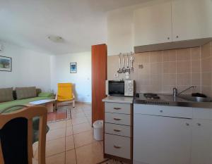 Apartment Tihana with a Partial Sea View