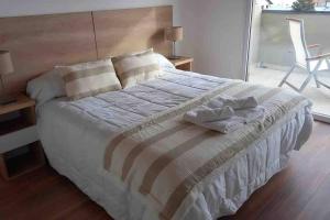 Moderno Departamento con vista al lago y montañas