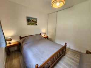 Appartements appartement T3 avec jardin proche village : photos des chambres