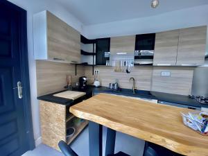 Appartements Maison 43 : photos des chambres