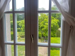 Maisons de vacances La Maison dans le jardin du Manoir de Bouron : photos des chambres