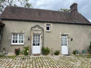Maisons de vacances La Maison dans le jardin du Manoir de Bouron : photos des chambres