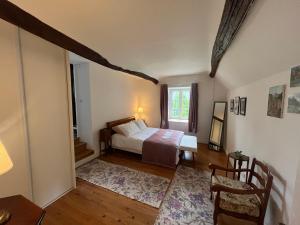 Maisons de vacances La Maison dans le jardin du Manoir de Bouron : photos des chambres