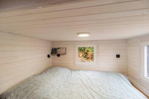 Chalets Jacuzzi Tiny-House face mer Evasion sur la falaise : photos des chambres