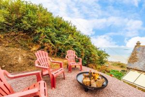 Chalets Jacuzzi Tiny-House face mer Evasion sur la falaise : photos des chambres