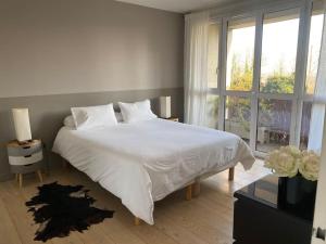 Appartements Au Milieu des Arbres : photos des chambres