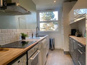Appartements Au Milieu des Arbres : photos des chambres