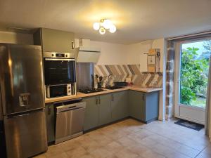 Maisons de vacances Ker Adele, longere cosy au coeur d-un bois : photos des chambres