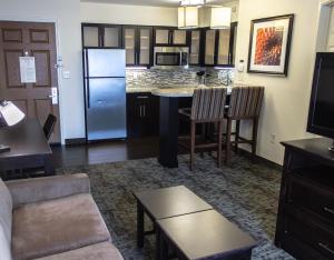 One-Bedroom King Suite with Sofa Bed room in Staybridge Suites Minot an IHG Hotel
