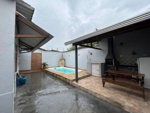 Casa ampla com Piscina e Churrasqueira a 5min da praia