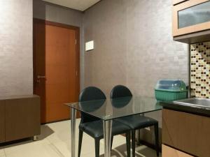Comfort 1BR Apartment at Thamrin Residence By Travelio