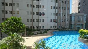 Comfy 2BR Apartment at Puncak Kertajaya Surabaya near ITS By Travelio