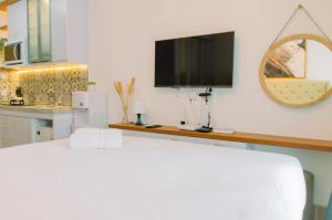 Cozy Stay Studio Apartment at B Residence near AEON Mall By Travelio