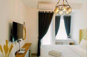 Cozy Stay Studio Apartment at B Residence near AEON Mall By Travelio