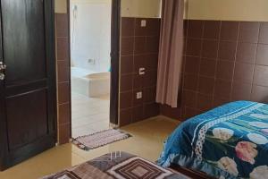 A villa with a pool located in a quiet area on the outskirts of Bali