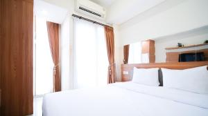 Strategic and Homey Studio at Tamasari Papilio Apartment By Travelio