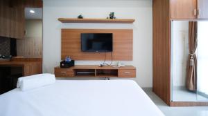 Strategic and Homey Studio at Tamasari Papilio Apartment By Travelio