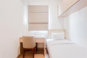 Spacious and Homey Living 3BR at Sky House BSD Apartment By Travelio