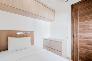 Spacious and Homey Living 3BR at Sky House BSD Apartment By Travelio