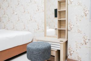 Homey Studio Apartment at Green Palm Residence By Travelio