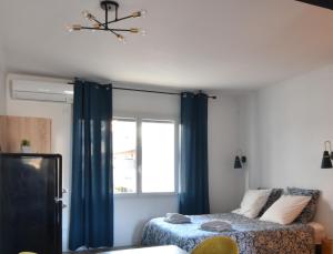 centre ville grand studio neuf climatisé +balcon