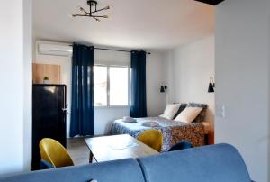 centre ville grand studio neuf climatisé +balcon