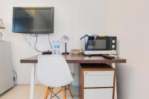 Minimalist and Warm Studio Room (No Kitchen) Kubikahomy Apartment By Travelio