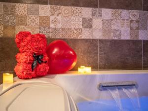 Appartements L-Evasion Sauna & Spa : photos des chambres