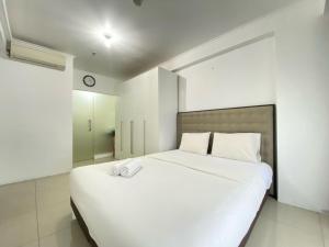 Exclusive 3BR at Gateway Pasteur Apartment By Travelio