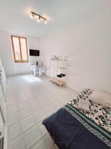 Appartements Studio cosy au coeur du centre ville : photos des chambres