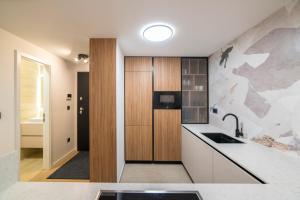 Optima Deluxe - Spacious 2BR - Private Garage