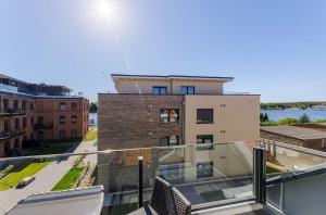 SeeGlück Malchow - Stilvolle Maisonette mit Balkonen & Seeblick