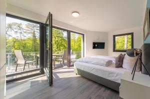 Shanti-Suite mit Dachterrasse, Kamin & Sauna am Krakower See