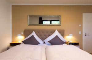 Mantra-Oase - Gemütliches Apartment mit Seeblick, Kamin & Wellness am Krakower See